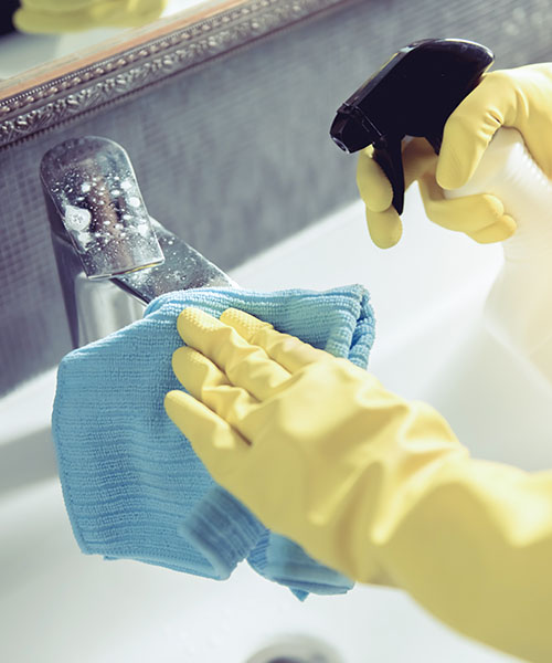 woman-cleaning-her-bathroom-2024-10-21-13-30-38-utc